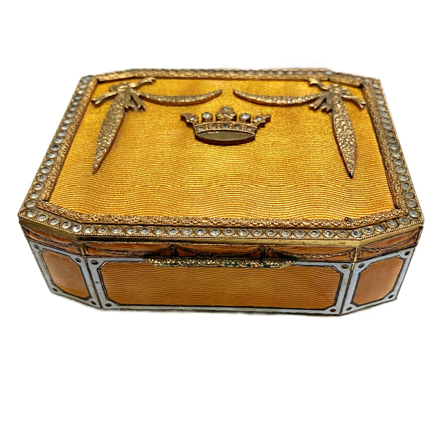 Close-up of guilloché enamel and paste stones on antique European box with crown top