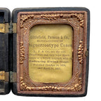 Antique Littlefield Rococo Scroll Union Case, Civil War era thermoplastic photographic case measuring 2-1/2" x 3", empty with original glass and one broken hinge.