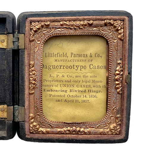 Antique Littlefield Rococo Scroll Union Case, Civil War era thermoplastic photographic case measuring 2-1/2" x 3", empty with original glass and one broken hinge.