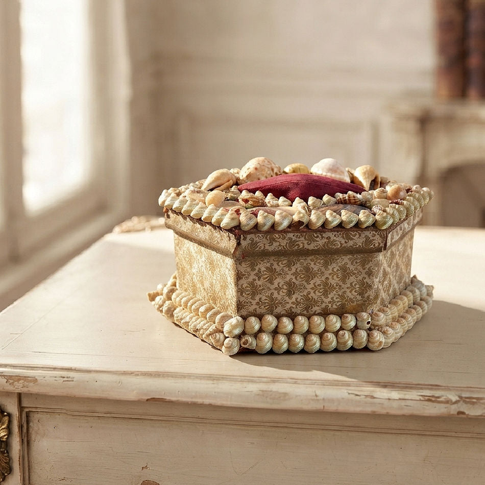 Antique French shellwork keepsake box styled on a writing desk