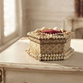 Antique French shellwork keepsake box styled on a writing desk