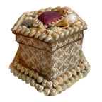 Side view of antique French shell work souvenir box