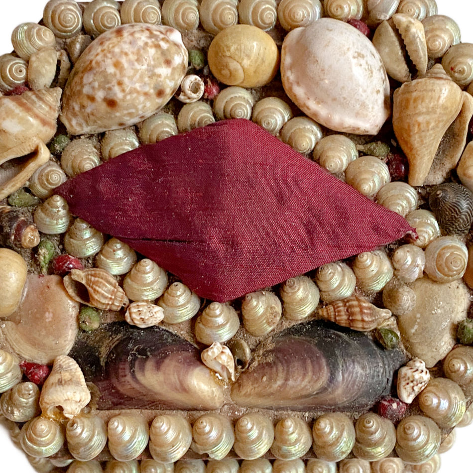 Close-up of delicate shellwork on antique French souvenir box