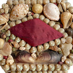 Close-up of delicate shellwork on antique French souvenir box
