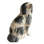 collectible staffordshire dog with separately molded leg detail