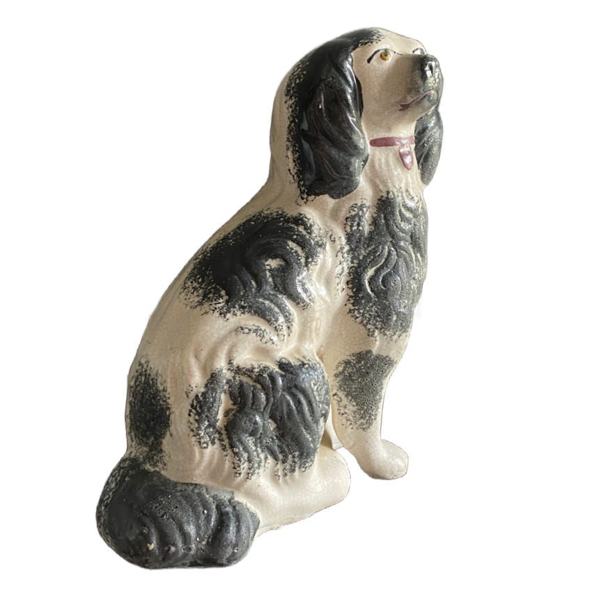 collectible staffordshire dog with separately molded leg detail