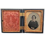 Antique Union case with elegant scrolled pattern, signed James & Co, featuring a single 19th-century woman portrait inside. Collectible photographic case.