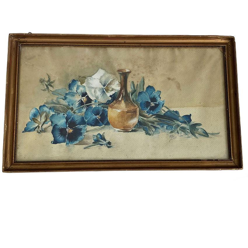 Antique French watercolor dated 1921, featuring a poetic bouquet of blue and white pansies, beautifully painted and presented in its original restored gilt frame.
