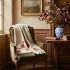 
Chasse au Renard fox hunt wrap draped over olive velvet French country chair