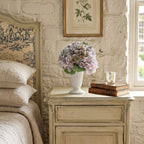 Château de Lorraine hydrangea bouquet arranged in a vase in a French country bedroom