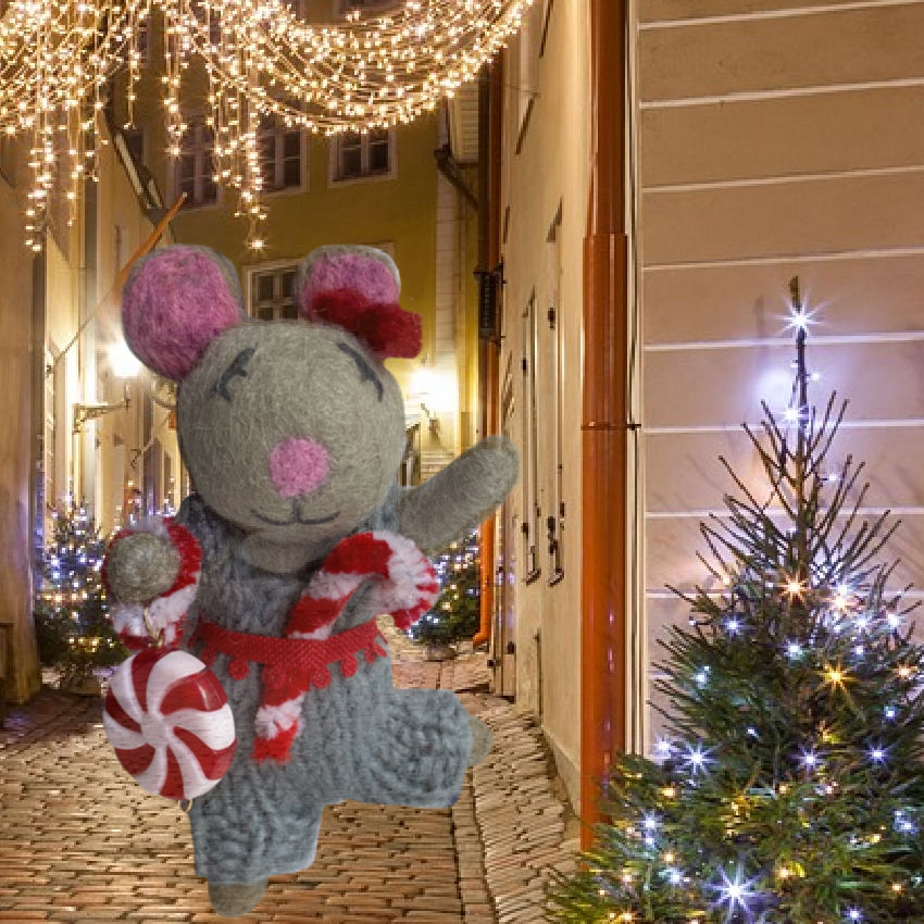 Coco Holiday Felted Mouse Ornament wearing a blue kint jumpsut and red bow, with a candy cane and a peppermint candy for the Christmas tree