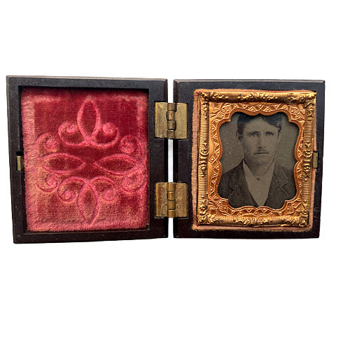 Antique miniature Union case with embossed Rococo scroll design and gentleman’s portrait inside. Rare 2-1/8" Victorian photographic keepsake collectible.