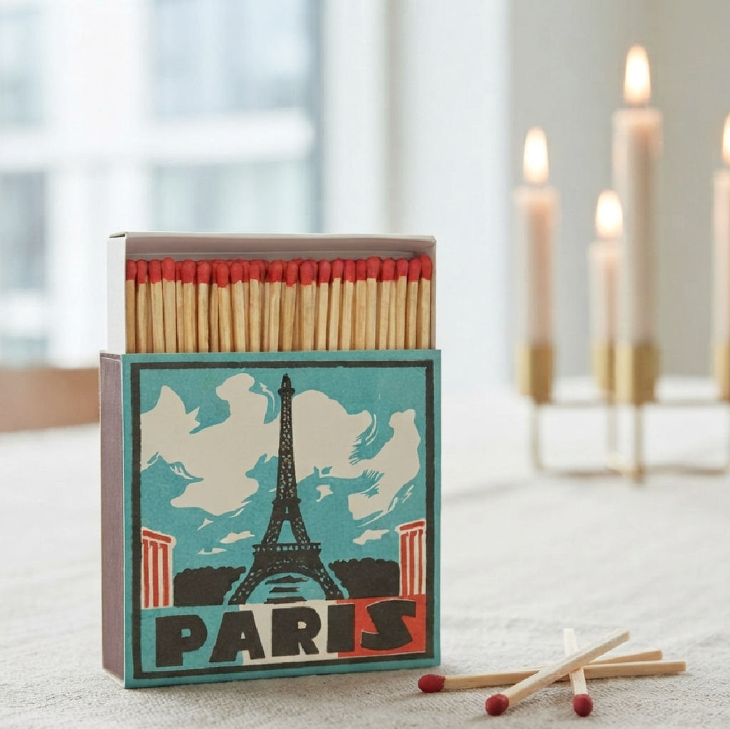 Paris Eiffel Tower letterpress matchbox with wooden matches on an elegant table