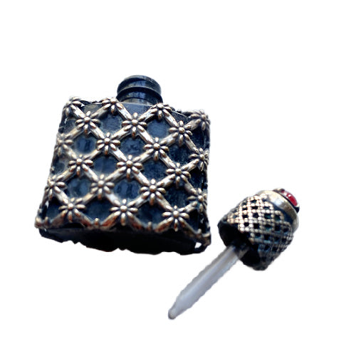 Delicate Art Deco French silver mini perfume bottle with ruby‑tone glass jewel — a finely crafted collectible treasure.