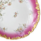Detail of the embossed scalloped rim with elaborate hand-applied 22-karat gold decoration on an antique T&V Limoges plate.