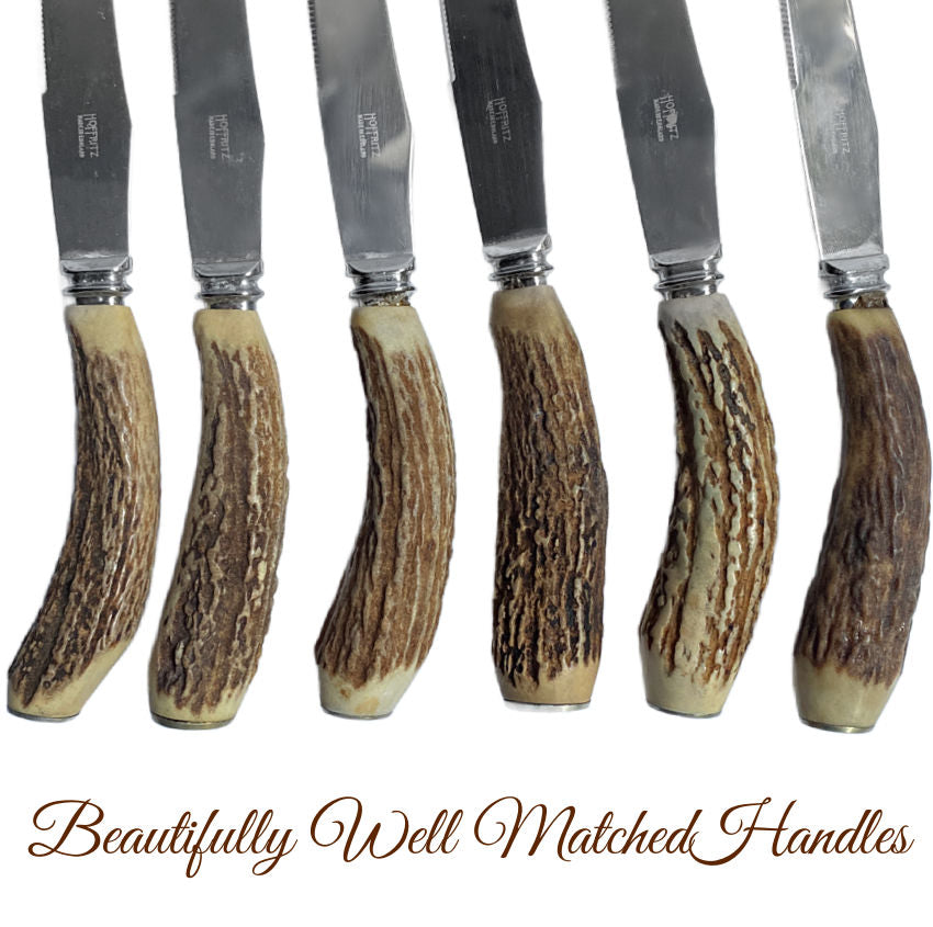 Set of six steak knives with antler handles unused, sold at luxury retailer Hoffritz