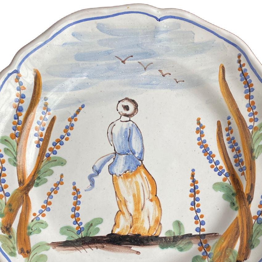 Rare hand painted French faience plate with girl amidst lavender field