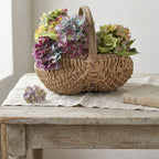 Antique French Hand-Woven Panier à Fesses, Antique Splint Basket with hydrangeas on a french table