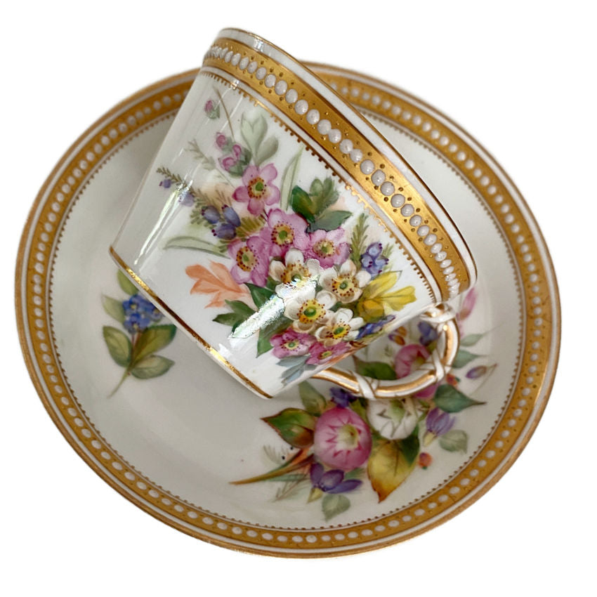 Antique Royal Worcester floral cup featuring a unique hand-painted botanical design and jeweled enamel decoration