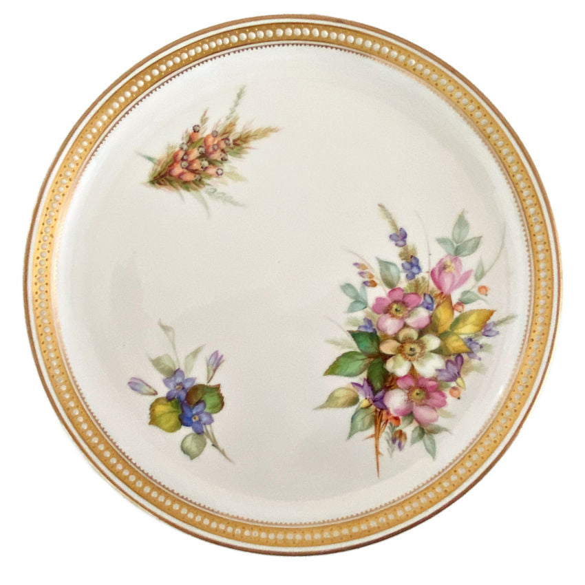antique Royal Worcester nine-inch floral porcelain plate with jeweled decoration and gilded details