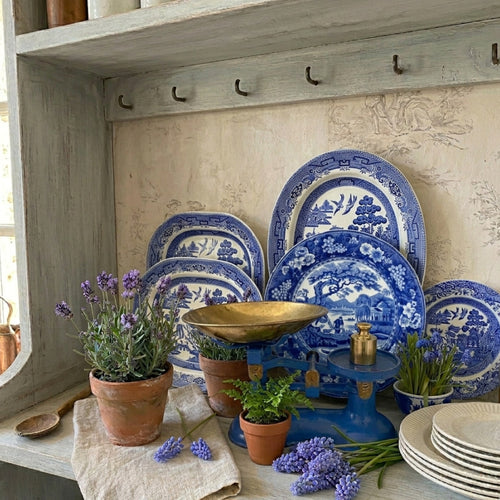 antique blue scale with blue willow platters