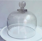 Close-up of hand-engraved scalloped pattern on antique French glass cloche