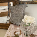 French cemetery memorial plaque displayed indoors as decorative collectible with vintage décor accents