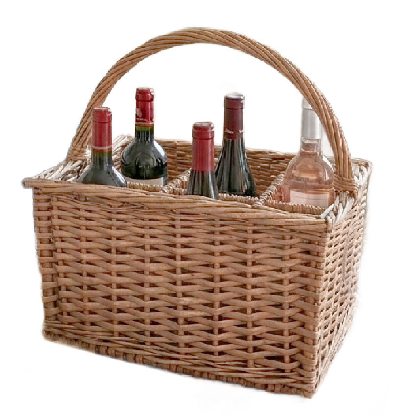 french country vineyard basket holding wine bottles in warm natural light