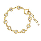 Elegant French floral bracelet with sparkling round crystals, crafted from antique molds. Parisian artisan design exudes timeless romance and refinement.