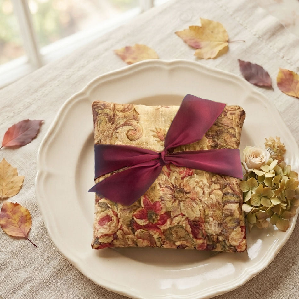 Autumn rose lavender sachet displayed in an antique French plate with hydrangeas and leaves