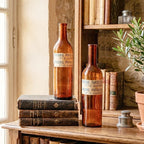Decorative antique French bottles bringing warmth and character to a collected home interior