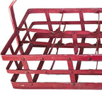 European wine cellar rack red painted iron bottle holder rustic decorative storage close up view