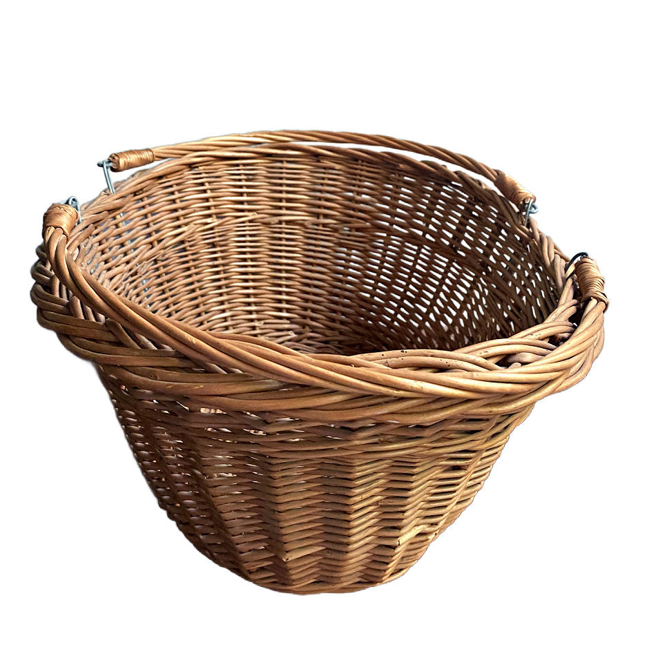 French country willow market basket with swing handles side view