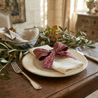 Gilded Passementerie wine and gold French wired ribbon on elegant French country table