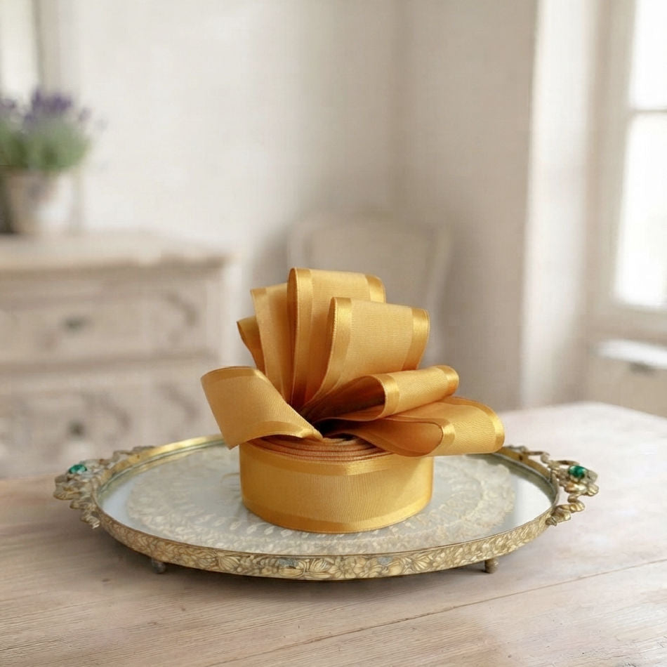 Golden Glow Satin French Wired Ribbon in French country living room on antiqu gold tray