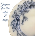 close detail of Flow Blue transferware pattern with roses ivy and scrollwork