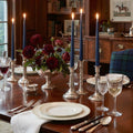 Heirloom Navy taper candles and styled on an elegant dining table with flowers