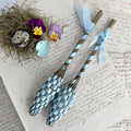 Set of two petite handwoven French lavender wands in light blue. Traditional Fuseau de Lavande crafted with high essential oil Lavandula on antique french letters with pansies and small blue eggs