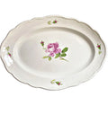 Antique Meissen porcelain serving dish with hand-painted pink roses. Elegant European floral china ideal for refined tables and collectors.