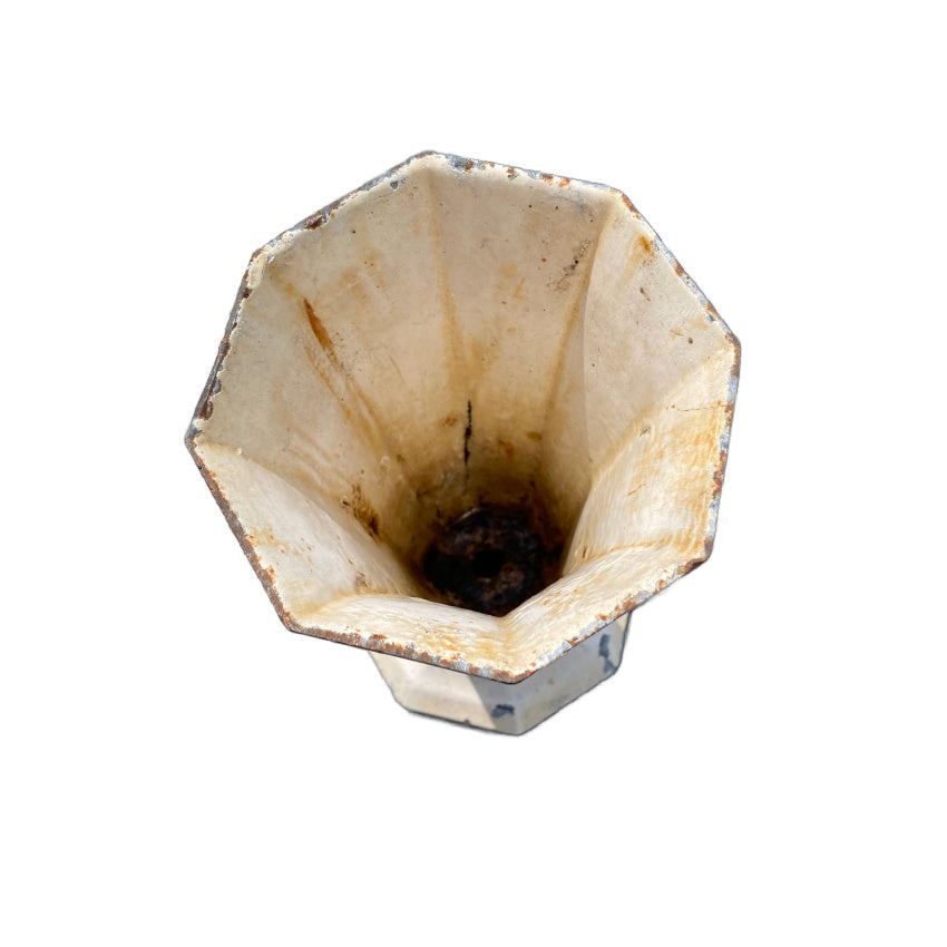 Decorative French cast iron urn with cream enamel, large collectible vase-sized piece top view