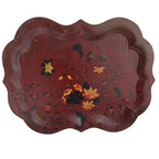 A large 19th century English tole tray in wine red with hand painted floral design, featuring a classic Chippendale shape with a central floral bouquet and surrounding leafy patterns.