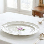 Large Meissen serving platter styled on a sophisticated dining table