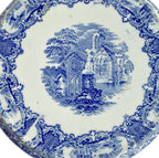 Late 19th century Petrus Regout blue and white transferware tea trivet in perfect condition. Crisp pastoral scene and classic Victorian charm.