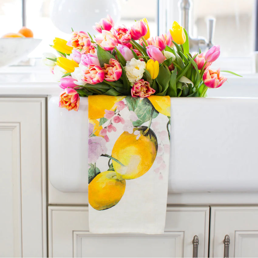 Lemon tea towel with tulips in a kitchen sink