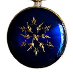 Cobalt blue enamel bow pin watch with Liga movement, a refined decorative jewel for your collection.