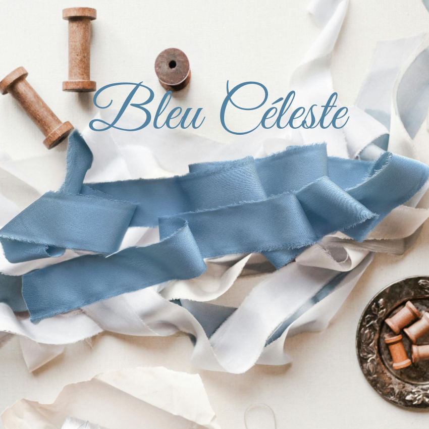 Luxurious silk-feel ribbon in Bleu Céleste. 1½" wide × 25 yards, soft and supple, perfect for gift wrapping, floral projects, and decorative accents.