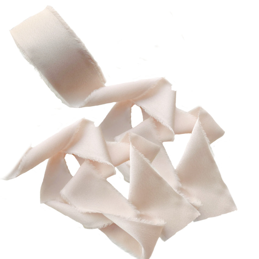 Soft, luxurious 1½-inch silk-feel ribbon in very light pink. Elegant Parisian trim for gift wrapping, décor, and couture-inspired creations.