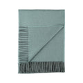 Indulge in this handwoven Celadon Mist alpaca throw, crafted from the finest baby alpaca for unmatched softness, warmth, and timeless sophistication.