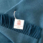 Indulge in this handwoven Slate Indigo alpaca throw, crafted from the finest baby alpaca for unmatched softness, warmth, and timeless sophistication.