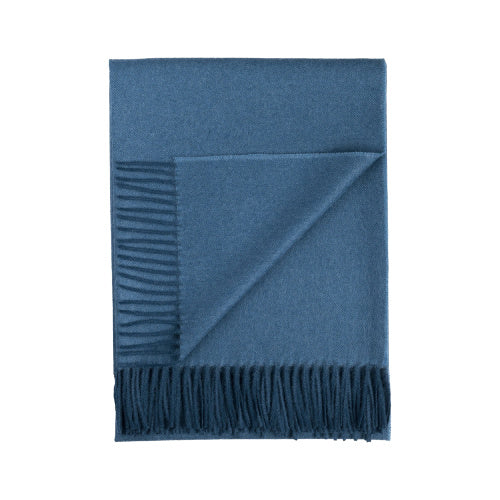 Indulge in this handwoven Slate Indigo alpaca throw, crafted from the finest baby alpaca for unmatched softness, warmth, and timeless sophistication.